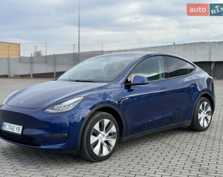 Синий Тесла Model Y, объемом двигателя 0 л и пробегом 83 тыс. км за 23800 $, фото 1 на Automoto.ua