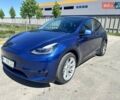 Синий Тесла Model Y, объемом двигателя 0 л и пробегом 91 тыс. км за 28000 $, фото 1 на Automoto.ua