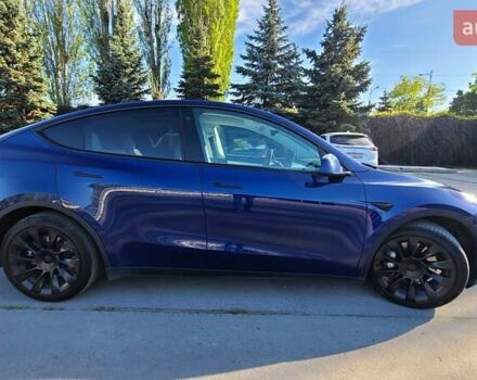 Синий Тесла Model Y, объемом двигателя 0 л и пробегом 110 тыс. км за 24900 $, фото 2 на Automoto.ua