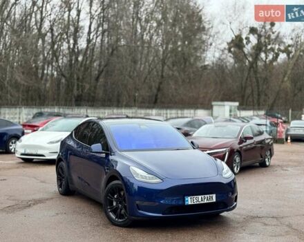 Синій Тесла Model Y, об'ємом двигуна 0 л та пробігом 77 тис. км за 22999 $, фото 1 на Automoto.ua