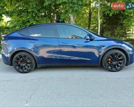 Синий Тесла Model Y, объемом двигателя 0 л и пробегом 65 тыс. км за 25000 $, фото 2 на Automoto.ua