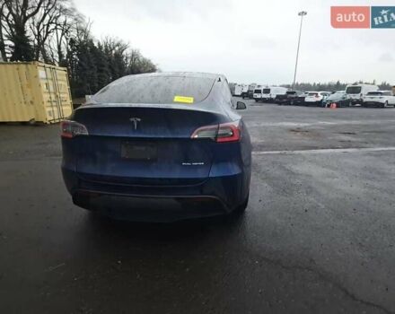 Синий Тесла Model Y, объемом двигателя 0 л и пробегом 63 тыс. км за 18000 $, фото 2 на Automoto.ua