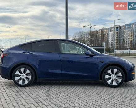 Синий Тесла Model Y, объемом двигателя 0 л и пробегом 83 тыс. км за 23800 $, фото 12 на Automoto.ua