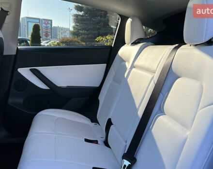 Синій Тесла Model Y, об'ємом двигуна 0 л та пробігом 64 тис. км за 26900 $, фото 18 на Automoto.ua