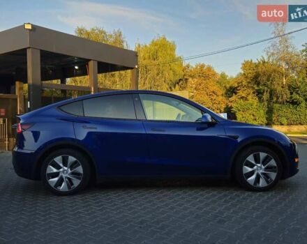 Синий Тесла Model Y, объемом двигателя 0 л и пробегом 99 тыс. км за 25900 $, фото 13 на Automoto.ua