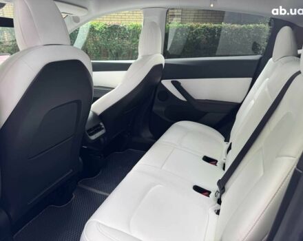 Синій Тесла Model Y, об'ємом двигуна 0 л та пробігом 86 тис. км за 19390 $, фото 19 на Automoto.ua