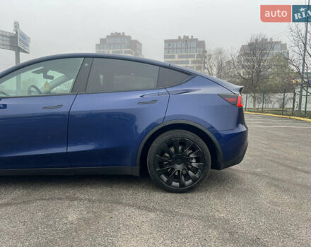 Синий Тесла Model Y, объемом двигателя 0 л и пробегом 125 тыс. км за 25997 $, фото 29 на Automoto.ua