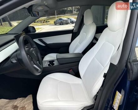 Синий Тесла Model Y, объемом двигателя 0 л и пробегом 86 тыс. км за 25900 $, фото 75 на Automoto.ua