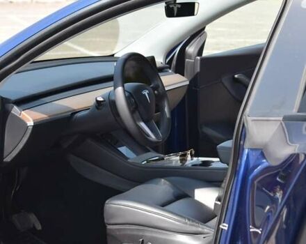 Синий Тесла Model Y, объемом двигателя 0 л и пробегом 81 тыс. км за 25499 $, фото 28 на Automoto.ua