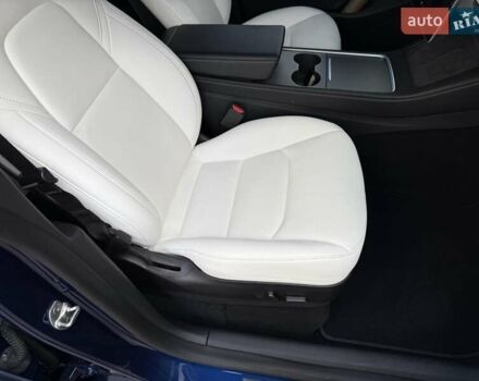 Синий Тесла Model Y, объемом двигателя 0 л и пробегом 86 тыс. км за 25900 $, фото 90 на Automoto.ua