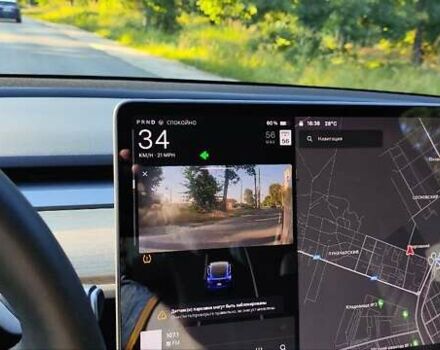 Синий Тесла Model Y, объемом двигателя 0 л и пробегом 62 тыс. км за 25700 $, фото 4 на Automoto.ua