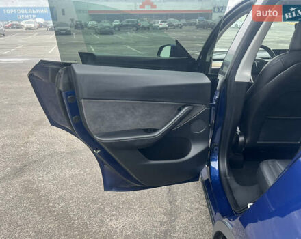 Синий Тесла Model Y, объемом двигателя 0 л и пробегом 125 тыс. км за 25997 $, фото 16 на Automoto.ua