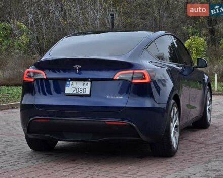 Синий Тесла Model Y, объемом двигателя 0 л и пробегом 99 тыс. км за 25500 $, фото 12 на Automoto.ua