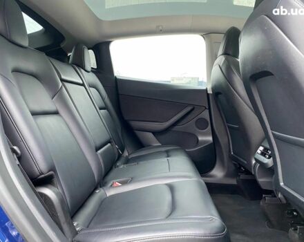 Синій Тесла Model Y, об'ємом двигуна 0 л та пробігом 91 тис. км за 25990 $, фото 20 на Automoto.ua
