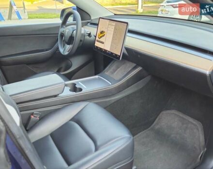 Синий Тесла Model Y, объемом двигателя 0 л и пробегом 99 тыс. км за 25900 $, фото 22 на Automoto.ua