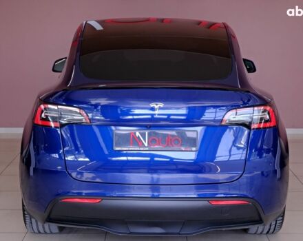Синий Тесла Model Y, объемом двигателя 0 л и пробегом 76 тыс. км за 19900 $, фото 5 на Automoto.ua