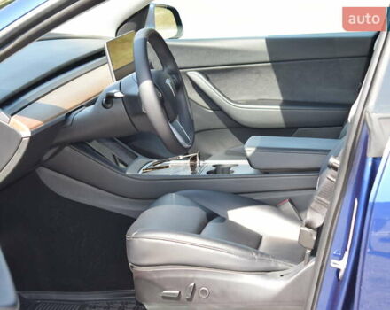 Синий Тесла Model Y, объемом двигателя 0 л и пробегом 81 тыс. км за 25499 $, фото 36 на Automoto.ua