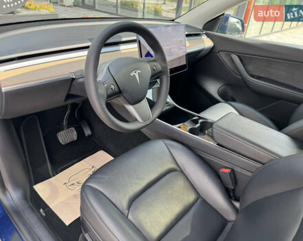 Синий Тесла Model Y, объемом двигателя 0 л и пробегом 83 тыс. км за 24999 $, фото 12 на Automoto.ua