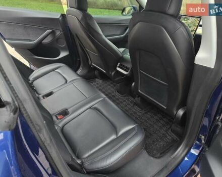 Синий Тесла Model Y, объемом двигателя 0 л и пробегом 99 тыс. км за 25500 $, фото 30 на Automoto.ua