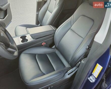 Синий Тесла Model Y, объемом двигателя 0 л и пробегом 99 тыс. км за 25900 $, фото 32 на Automoto.ua