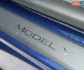 Синий Тесла Model Y, объемом двигателя 0 л и пробегом 88 тыс. км за 31990 $, фото 29 на Automoto.ua