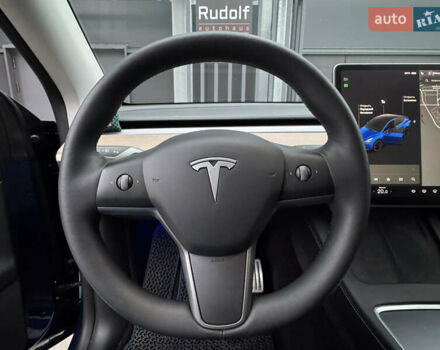 Синий Тесла Model Y, объемом двигателя 0 л и пробегом 88 тыс. км за 31990 $, фото 44 на Automoto.ua