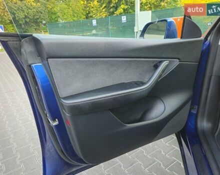 Синий Тесла Model Y, объемом двигателя 0 л и пробегом 99 тыс. км за 25900 $, фото 26 на Automoto.ua