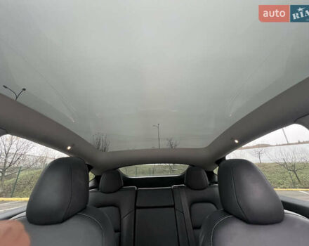 Синий Тесла Model Y, объемом двигателя 0 л и пробегом 125 тыс. км за 25997 $, фото 3 на Automoto.ua