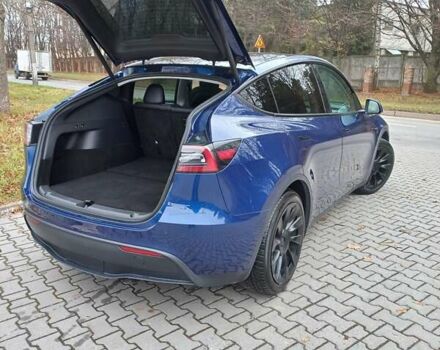 Синий Тесла Model Y, объемом двигателя 0 л и пробегом 91 тыс. км за 25850 $, фото 11 на Automoto.ua