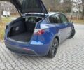Синий Тесла Model Y, объемом двигателя 0 л и пробегом 91 тыс. км за 25850 $, фото 11 на Automoto.ua