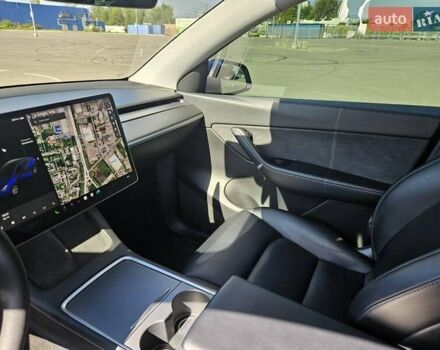 Синий Тесла Model Y, объемом двигателя 0 л и пробегом 53 тыс. км за 23500 $, фото 19 на Automoto.ua