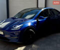 Синій Тесла Model Y, об'ємом двигуна 0 л та пробігом 76 тис. км за 26200 $, фото 1 на Automoto.ua