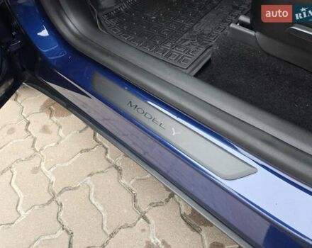 Синий Тесла Model Y, объемом двигателя 0 л и пробегом 99 тыс. км за 25500 $, фото 34 на Automoto.ua