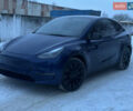 Синий Тесла Model Y, объемом двигателя 0 л и пробегом 99 тыс. км за 19999 $, фото 1 на Automoto.ua