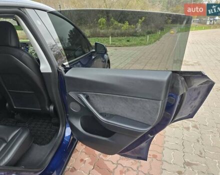 Синий Тесла Model Y, объемом двигателя 0 л и пробегом 99 тыс. км за 25500 $, фото 32 на Automoto.ua