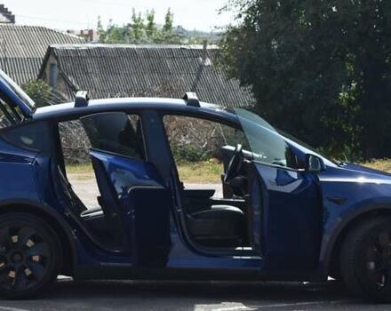 Синий Тесла Model Y, объемом двигателя 0 л и пробегом 81 тыс. км за 25499 $, фото 20 на Automoto.ua