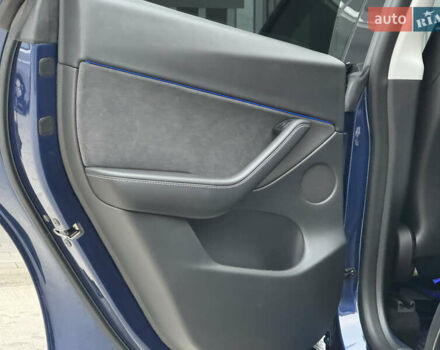 Синий Тесла Model Y, объемом двигателя 0 л и пробегом 88 тыс. км за 31990 $, фото 33 на Automoto.ua