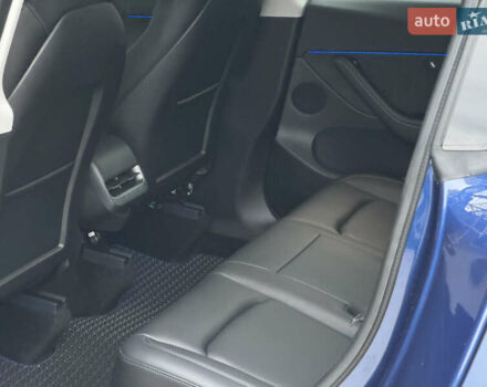 Синий Тесла Model Y, объемом двигателя 0 л и пробегом 88 тыс. км за 31990 $, фото 32 на Automoto.ua
