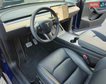 Синий Тесла Model Y, объемом двигателя 0 л и пробегом 99 тыс. км за 25900 $, фото 31 на Automoto.ua