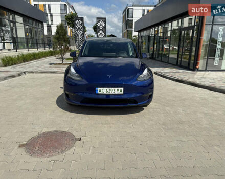 Синий Тесла Model Y, объемом двигателя 0 л и пробегом 83 тыс. км за 24999 $, фото 1 на Automoto.ua