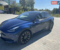 Синий Тесла Model Y, объемом двигателя 0 л и пробегом 127 тыс. км за 24700 $, фото 2 на Automoto.ua