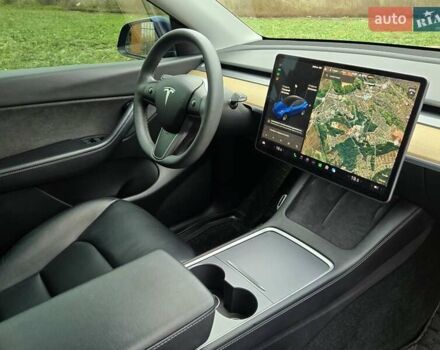 Синий Тесла Model Y, объемом двигателя 0 л и пробегом 99 тыс. км за 25500 $, фото 23 на Automoto.ua