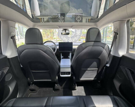 Синий Тесла Model Y, объемом двигателя 0 л и пробегом 83 тыс. км за 24999 $, фото 25 на Automoto.ua