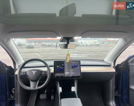 Синий Тесла Model Y, объемом двигателя 0 л и пробегом 125 тыс. км за 25997 $, фото 6 на Automoto.ua