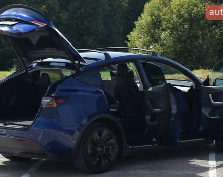 Синий Тесла Model Y, объемом двигателя 0 л и пробегом 81 тыс. км за 25499 $, фото 23 на Automoto.ua