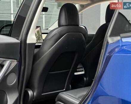 Синий Тесла Model Y, объемом двигателя 0 л и пробегом 66 тыс. км за 25500 $, фото 16 на Automoto.ua