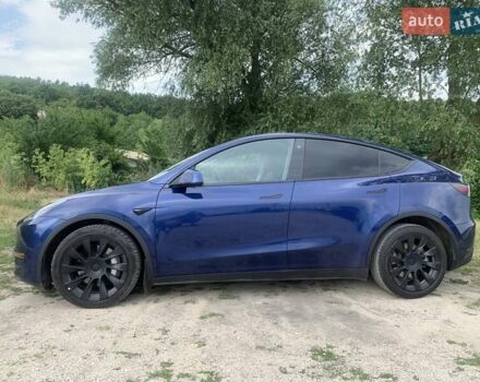 Синий Тесла Model Y, объемом двигателя 0 л и пробегом 75 тыс. км за 22900 $, фото 3 на Automoto.ua