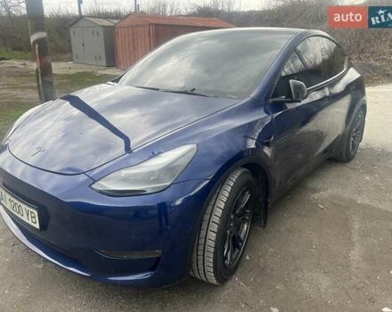 Синий Тесла Model Y, объемом двигателя 0 л и пробегом 101 тыс. км за 23999 $, фото 1 на Automoto.ua