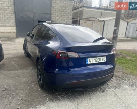 Синий Тесла Model Y, объемом двигателя 0 л и пробегом 101 тыс. км за 23999 $, фото 3 на Automoto.ua