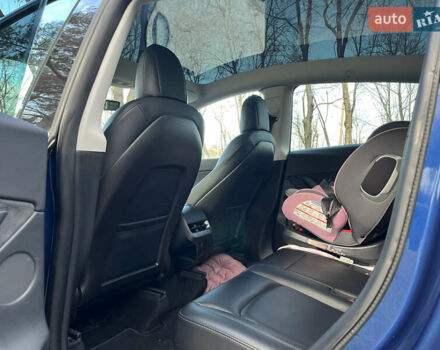 Синій Тесла Model Y, об'ємом двигуна 0 л та пробігом 72 тис. км за 27500 $, фото 26 на Automoto.ua